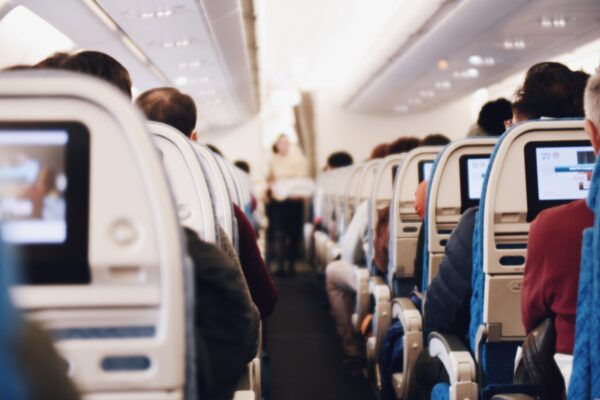 Image of people sitting in airplane seats