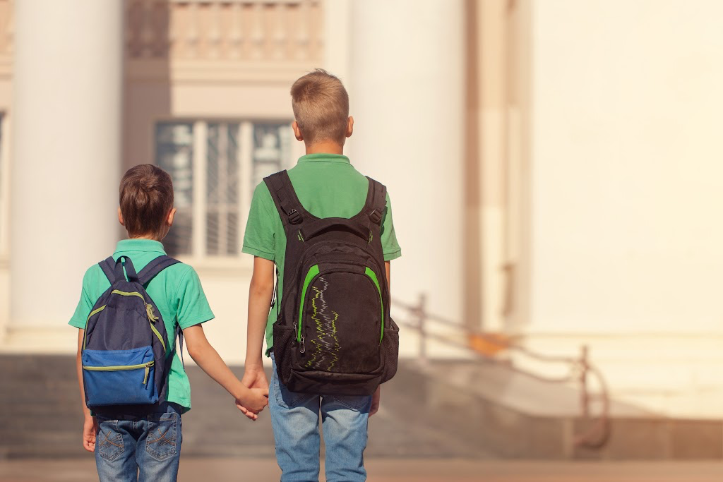 two boys starting on-campus learning